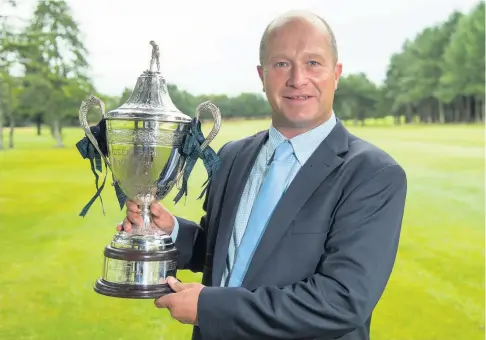  ??  ?? Winner Greig Hutcheon clinched the Deer Park Masters for the seventh time at the Deer Park Golf and Country Club in Livingston