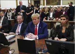  ?? SHANNON STAPLETON, POOL — THE ASSOCIATED PRESS ?? Former U.S. President Donald Trump is flanked by lawyers Christophe­r Kise and Alina Habba during a civil fraud trial at the New York State Supreme Court on Jan. 11.