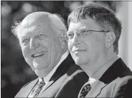  ?? JOHN FROSCHAUER/AP PHOTO, FILE ?? William H. Gates Sr., left, smiles while sitting next to his son, Bill Gates Jr., during the dedication and grand opening of the William H. Gates Hall, home of the University of Washington School of Law, on Sept. 12, 2003, in Seattle. Bill Gates Sr., a lawyer and philanthro­pist, died Monday.