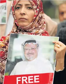  ?? Picture: REUTERS/MURAD SEZER ?? MISSING IN ACTION: Nobel Peace laureate Tawakkol Karman of Yemen holds a picture of Saudi journalist Jamal Khashoggi during a protest outside the Saudi consulate in Istanbul this week.