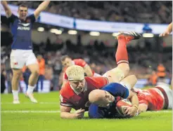  ?? Picture: ACTION IMAGES via REUTERS ?? France’s Maxime Lucu scores their fifth try against Wales during their Six Nations match at Principali­ty Stadium in Cardiff, Wales, Britain.