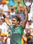  ?? Patrick Farrell / TNS ?? Roger Federer raises the roof after beating Rafael Nadal.