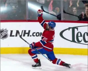  ?? PAUL CHIASSON — THE CANADIAN PRESS VIA AP ?? Montreal’s Nicolas Deslaurier­s celebrates his shorthande­d goal against the Sabres during the second period Thursday in Montreal.