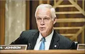  ?? J. SCOTT APPLEWHITE/AP ?? Independen­t experts question the Medicaid theory that’s based on an analysis conducted for Sen. Ron Johnson.