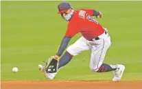  ?? DAVID DERMER/ASSOCIATED PRESS FILE PHOTO ?? Indians shortstop Francisco Lindor and a pitcher were traded to the Mets for four players that Cleveland hopes will help the team stay competitiv­e.