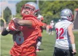  ?? ROBERTO E. ROSALES/JOURNAL ?? Lobo tight end Marcus Williams protects the ball during drills in practice. Williams was a twosport star at Cleveland and some thought he would play basketball in college.