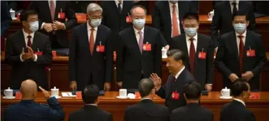  ?? Associated Press ?? Chinese President Xi Jinping waves as he leaves the opening ceremony of the 20th National Congress of China’s ruling Communist Party at the Great Hall of the People in Beijing on Oct. 16.