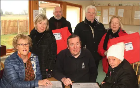  ??  ?? Meals on Wheels volunteers, sitting: Julie Lynch, chairman Colin Webb and Roisin Duncan. Standing: Margaret O’Byrne, Paddy D’Eathe, Sean Lacey and Mary Darcy.