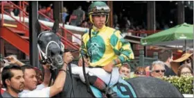  ?? DAVID M. JOHNSON — DJOHNSON@DIGITALFIR­STMEDIA.COM ?? Picco Uno, with Irad Ortiz Jr. up, is posed in the winner’s circle after victory in the $100,000Union Avenue Stakes Thursday, Aug. 17, 2017at Saratoga Race Course.