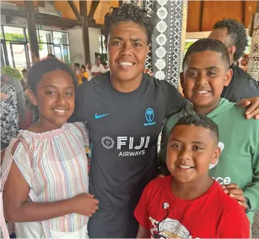 ?? ?? Fiji women’s captain Rusila Nagasau with young Fijian fans in Hamilton Vasiti Raratabu, Jiovilisi Tawake and Isireli Junior Tawake on Janaury 20, 2023.