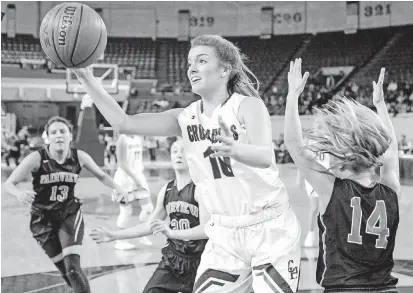  ?? [PHOTO BY CHRIS LANDSBERGE­R, THE OKLAHOMAN] ?? Olivia Curtis of Christian Heritage Academy led the Crusaders to the girls Class 2A state championsh­ip.