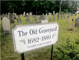  ?? EAST BRIDGEWATE­R BICENTENNI­AL COMMITTEE ?? The East Bridgewate­r Bicentenni­al Committee gathers at the town offices. The Old Graveyard Cemetery was founded by the earliest settlers of the town, and was in use from 1682 to 1889.