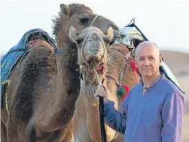  ??  ?? Mark Evans crossed the Empty Quarter desert on foot and by camel