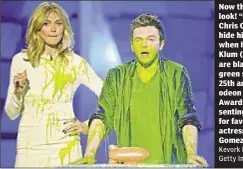  ??  ?? Now that’s a good look! “Glee” star Chris Colfer can’t hide his shock when he and Heidi Klum (both at l.) are blasted with green slime at the 25th annual Nickelodeo­n Kids Choice Awards while presenting the award for favorite TV actress to Selena Gomez....
