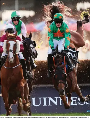  ?? PA ?? Baily Moon and Andrew Ring (right) take a spectacula­r fall at the first fence in yesterday’s Galway Blazers Chase