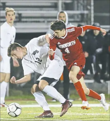  ?? Charles LeClaire/For the Post-Gazette ?? Avonworth’s Owen North, right, challenges West Shamokin’s Luke Alese for the ball in a PIAA first-round game Tuesday night. The Antelopes advanced with a 4-1 win.