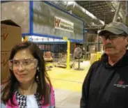  ?? PAUL POST — PPOST@DIGITALFIR­STMEDIA.COM ?? U.S. Rep. Elise Stefanik, left, met many of the workers at Hollingswo­rth & Vose company’s Easton plant on Tuesday, including Ron Stone of South Glens Falls. Stone discussed the upcoming South High Marathon Dance, which his family contribute­s to, with...