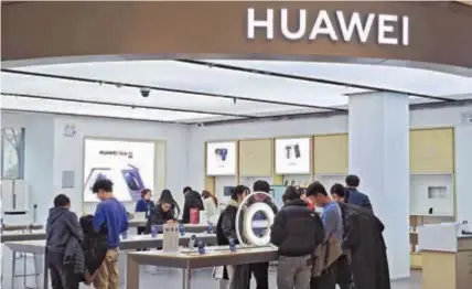  ?? ?? Consumers are seen at a Huawei store in Hengshui, north China’s Hebei Province. Huawei overtook Apple in terms of quarterly shipments of tablet computers in China in the last three months of 2023, according to an Internatio­nal Data Corp report. Huawei had a 30.8 percent market share in the 4th quarter, to Apple’s 30.5 percent. — CFP