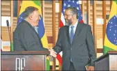  ?? DPA ?? CANCILLERE­S. Mike Pompeo y Ernesto Araújo, discípulo del gurú de Bolsonaro: Olavo de Carvalho.