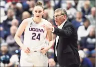  ?? Williams Paul / Icon Sportswire via Getty Images ?? UConn Huskies coach Geno Auriemma talks with Anna Makurat (24) during a game last season. Auriemma wants Makurat to be a more consistent 3-point shooter.