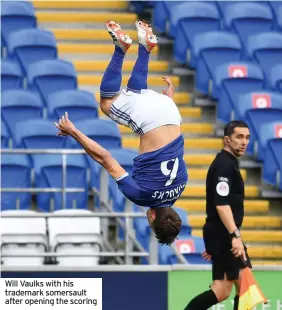  ??  ?? Will Vaulks with his trademark somersault after opening the scoring