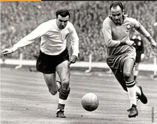  ??  ?? Chasing down Brazil striker Pepe in a friendly at Wembley in 1963