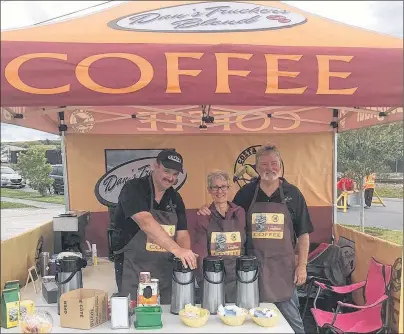  ?? SUBMITTED PHOTO ?? Dan Leslie, right, was joined by his wife Dawn and colleague Kevin MacDonald of Kevin’s Courier during the recent Touch a Truck event at Open Hearth Park in Sydney, where some of the proceeds from coffee they sold supported the Children’s Wish...
