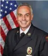  ?? ?? Dayton Fire Department veteran Mike Rice was sworn-in as director and chief.