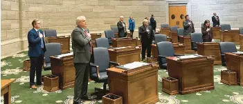  ?? DAVID A. LIEB/AP ?? Missouri senators recite the Pledge of Allegiance as the chamber convenes Jan. 3 in Jefferson City, Missouri.