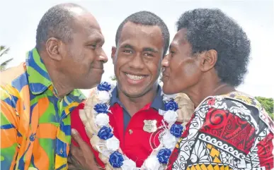  ?? Photo: Ronald Kumar ?? Suva Special School headboy Tevita Kete with his parents Jope and Katalaini Kete following the prefect induction on February 9, 2018.