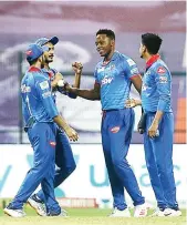  ?? Photos: IPL ?? Shikhar Dhawan gave Delhi a dream start, eventually scoring 78 runs; (right) Kagiso Rabada was at his best at the death overs, picking up three wickets in that period