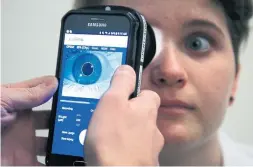  ?? MANUEL BALCE CENETA THE ASSOCIATED PRESS ?? Washington-based Children's National Medical Center is testing an experiment­al device that aims to measure pain according to how pupils react to certain stimuli.
