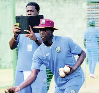  ?? FILE ?? Former Windies men’s team coach Vasbert Drakes during a training session with the team at the Beausejour Cricket Ground, St Lucia, on Friday, October 16, 2015.