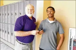  ?? PALM BEACH COUNTY SCHOOL DISTRICT ?? Boynton
Beach Community High teacher Michael Cavanaugh plans to permanentl­y hand over his Honda’s keys June 1 to senior Jacquez Champion, who he says
“is everything that teachers say epitomizes a good student.”