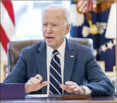  ?? AP photo ?? President Joe Biden speaks before signing the American Rescue Plan, a coronaviru­s relief package, in the Oval Office of the White House on Thursday in Washington.