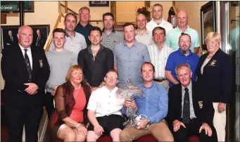  ??  ?? Joe Buckley (seated second from left) presenting his father Jack Buckley’s President’s Prize to Men’s winner Matthew Leacy with Noreen C and Jack Buckley. Second row, l-r: Derry McCarthy Captain, Peter McEnery 2nd, Simon Gallivan (BG), Conor Healy 4th,...