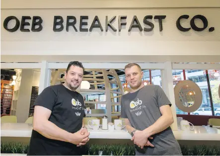  ?? PHOTOS: LYLE ASPINALL ?? Mauro Martina, left, and Scott Adamson of OEB Breakfast Co. in their new downtown location.