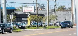  ??  ?? Jewel Chowdhury has operated his ARC Motors on Fairbanks Avenue since 2014, calling it a “wonderful place for sales.” He says moving from the location would be “a big loss.”