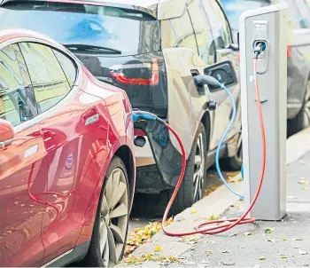  ?? ?? POPULAR: New data suggests the transition to electric vehicles is fully under way.