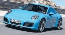  ??  ?? Revised 911 bumper has larger grilles and active flaps for better aerodynami­cs.