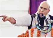  ??  ?? Union Home Minister Rajnath Singh paying floral tributes to the martyrs at a memorial at Kathua, 80km from Jammu on Sunday