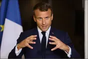  ?? (Photo AFP) ?? Avec un air de Rocard, Emmanuel Macron a lancé, hier, que la France ne doit pas être « un pays trop attractif » pour « continuer à accueillir tout le monde dignement ».