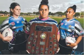  ??  ?? Brothers’ Lyrech Mara (middle) with Western Lions leaders Paige Horvat and Ange Solomon at Townsville Sports Reserve. Picture: Matthew Elkerton