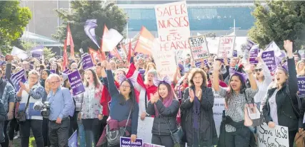  ?? Photo / Greg Bowker ?? Protesting Auckland nurses strive to make their voices heard in Aotea Square.