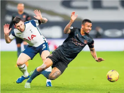  ?? Photo / Getty Images ?? Gabriel Jesus and Manchester City were given few opportunit­ies by Pierre-Emile Hojbjerg and Spurs.