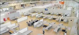  ?? BACHCHAN KUMAR/HT PHOTO ?? A Covid-19 quarantine facility with 1,100 beds has been set up at the CIDCO exhibition centre in Vashi.