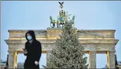  ??  ?? A man walks in Berlin. Germany’s coronaviru­s deaths rose by 986 in 24 hours, the most since the start of the pandemic.