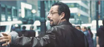  ?? A24 ?? ADAM SANDLER flexes his considerab­le acting chops as a tense, agitated jeweler in the film “Uncut Gems.”