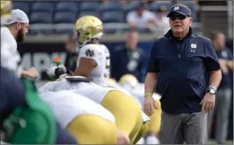  ?? (AP/Phelan M. Ebenhack) ?? Coach Brian Kelly (above), shown before Notre Dame’s bowl victory over Iowa State, said coaches are trying to figure out ways to re-create some of what has been lost since spring practices were wiped out by the coronaviru­s pandemic. “Your football team is under constructi­on. A new group of players that require time. Those hours mean a lot,” Kelly said.