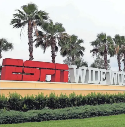  ?? RAOUX/AP JOHN ?? A sign marking the entrance to ESPN’S Wide World of Sports at Walt Disney World is seen June 3 in Kissimmee, Fla.